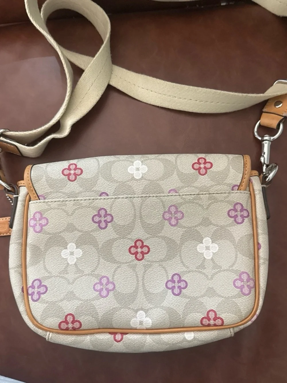 Coach Beige Canvas Crossbody with Purple and Red Floral Accents
